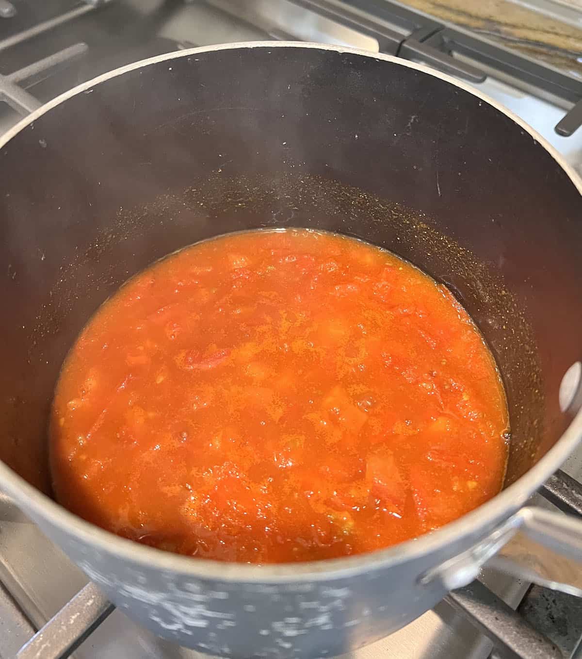 prepare the tomatoes for the aloo masala