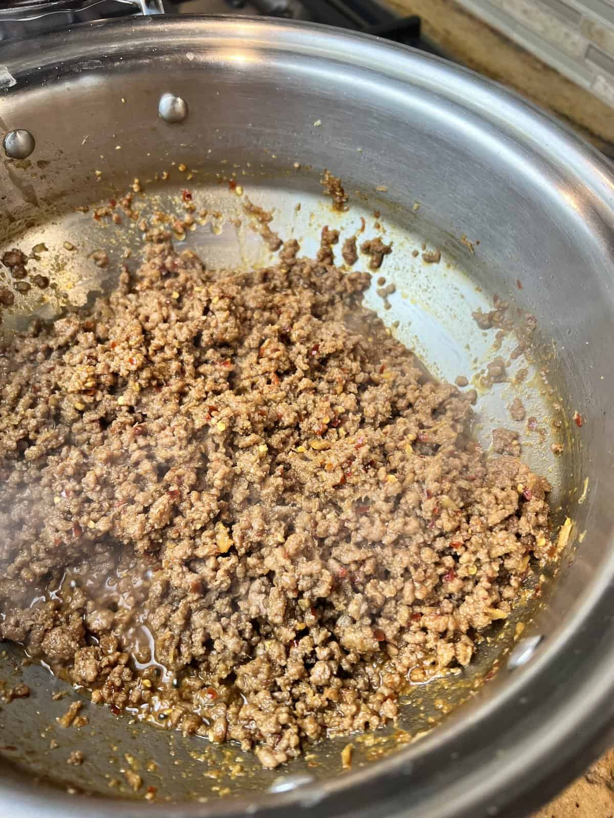 Saute ground beef for Korean beef bowls Till Dry