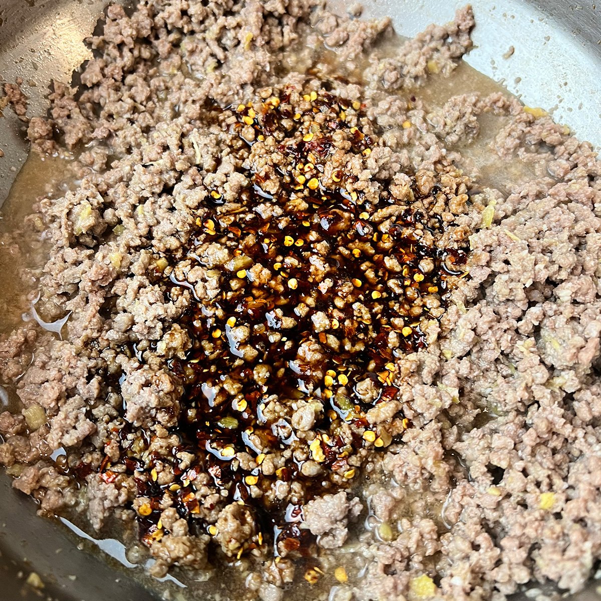 Asian inspired beef being cooked.