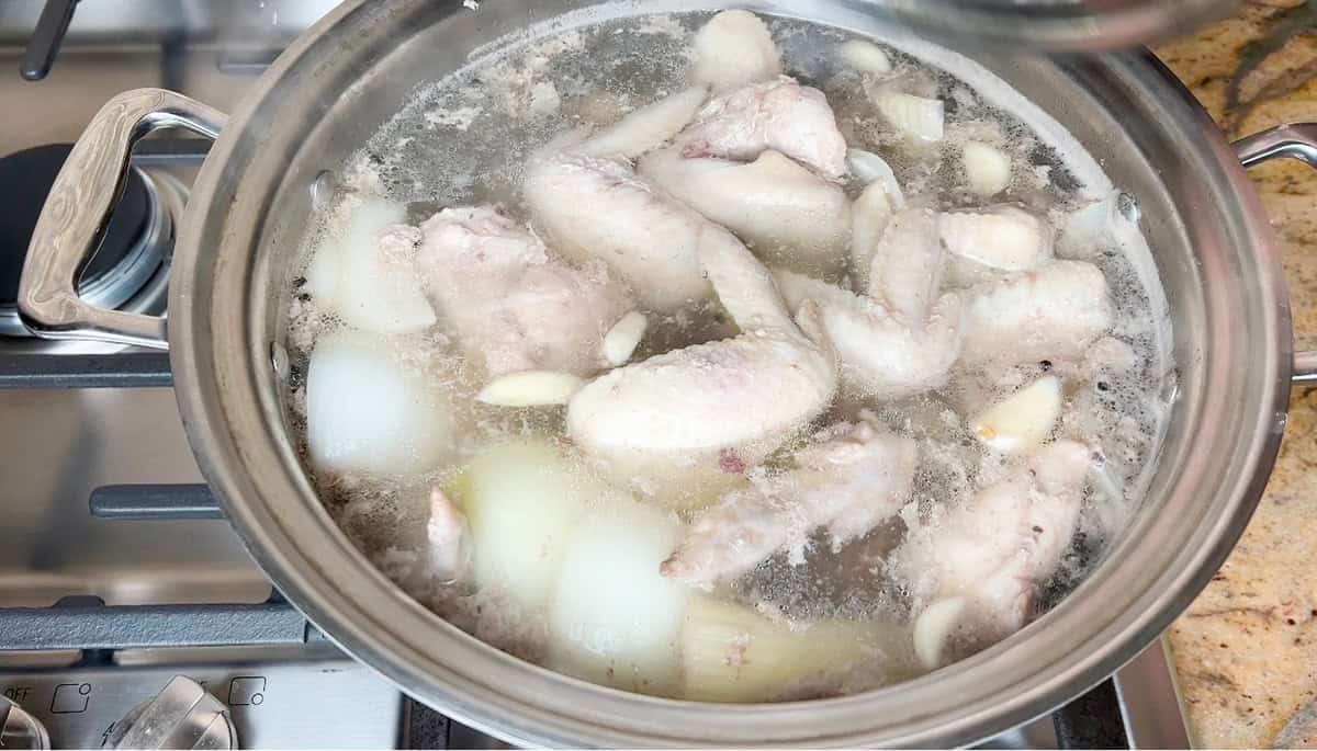 Chicken broth is cooked and ready to be strained and stored.