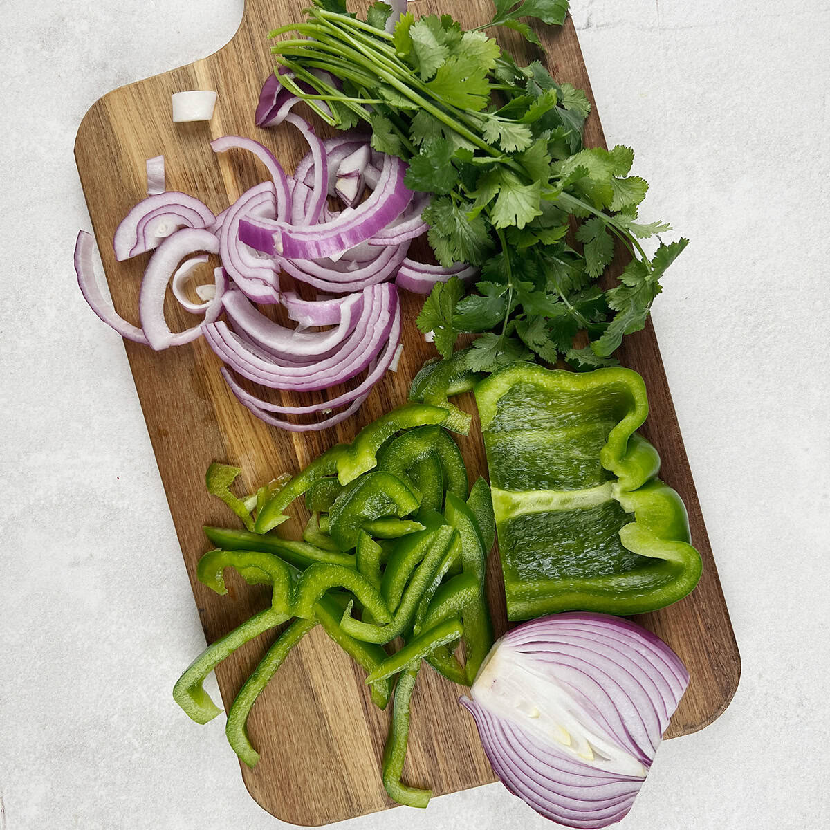 Veggie prep for a sandwich recipe.