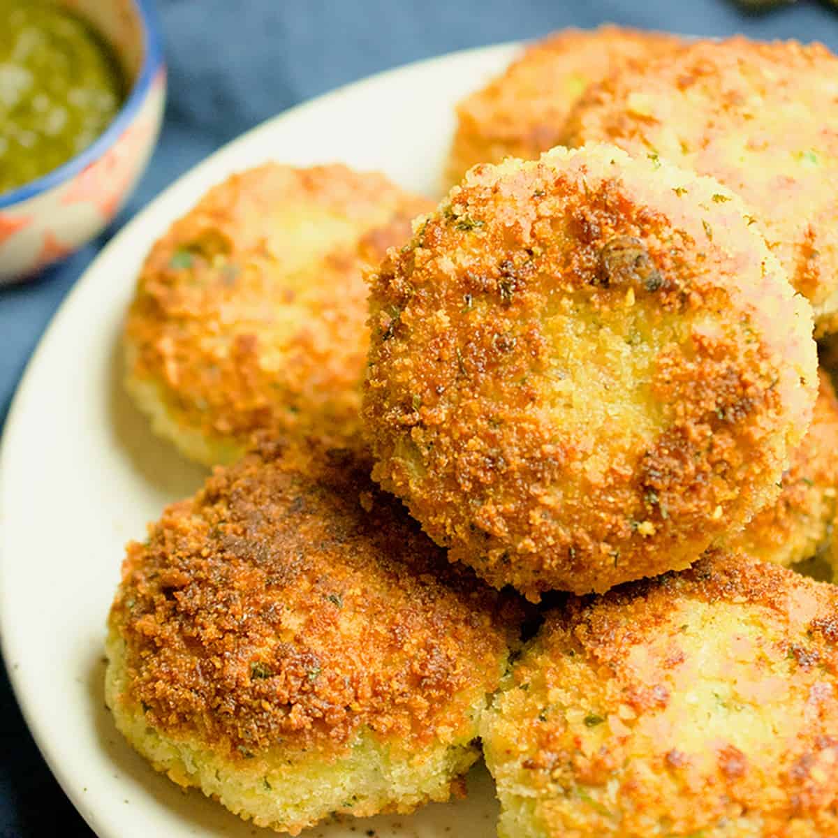 Potato cutlets with a crispy outside and fluffy inside are plated and ready to eat.