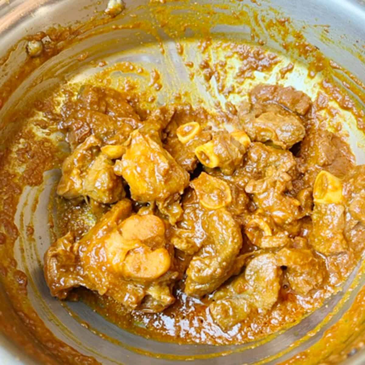 Meat being roasted for a Pakistani curry recipe.