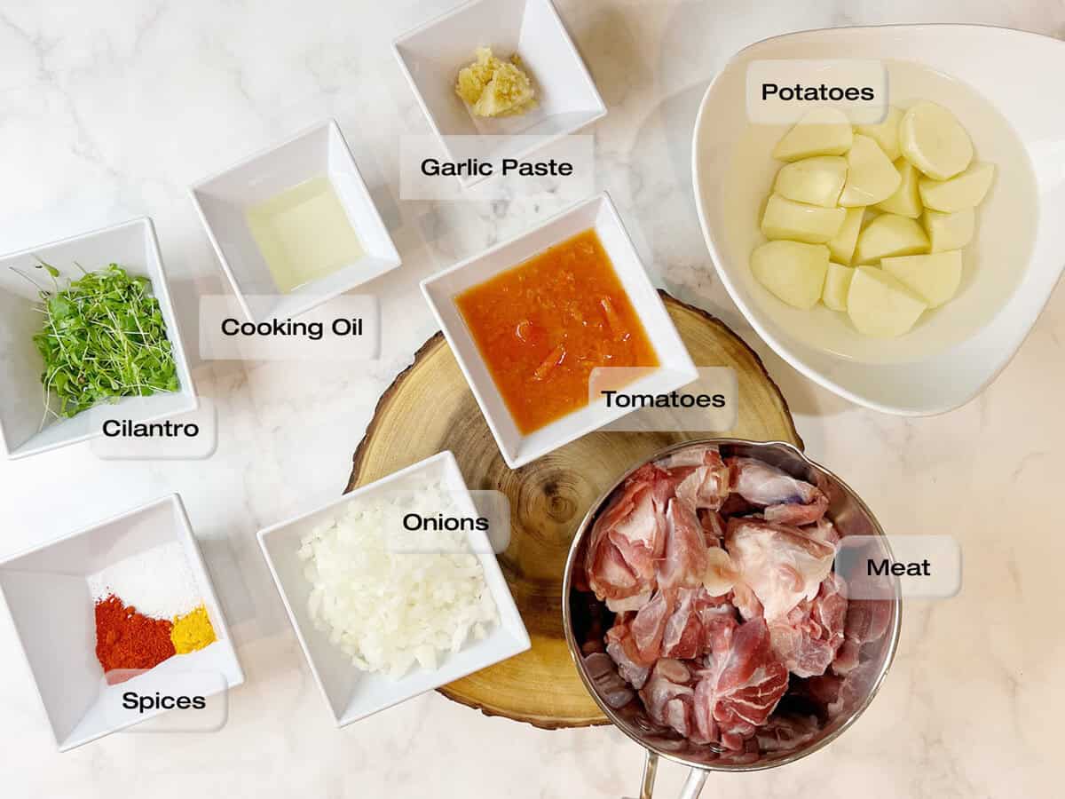 Ingredients for an aloo gosht recipe.