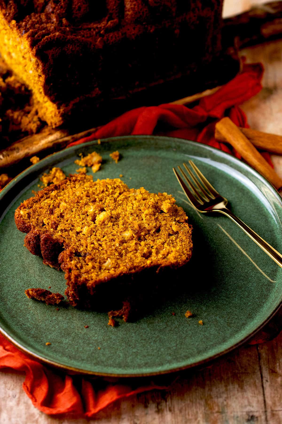 A freshly baked slice of pumpkin bread.