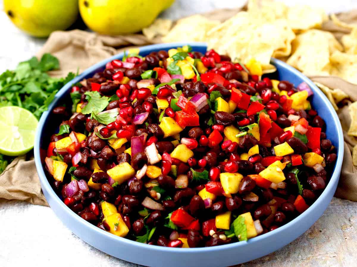 Mango black bean salsa with tortilla chips on the side.