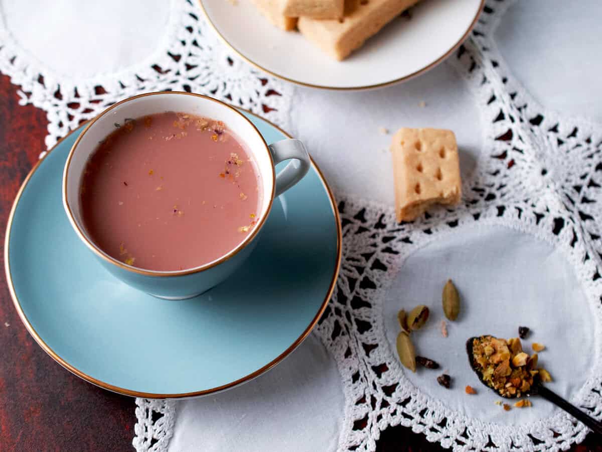 Kashmiri Chai with a pistachio garnish.
