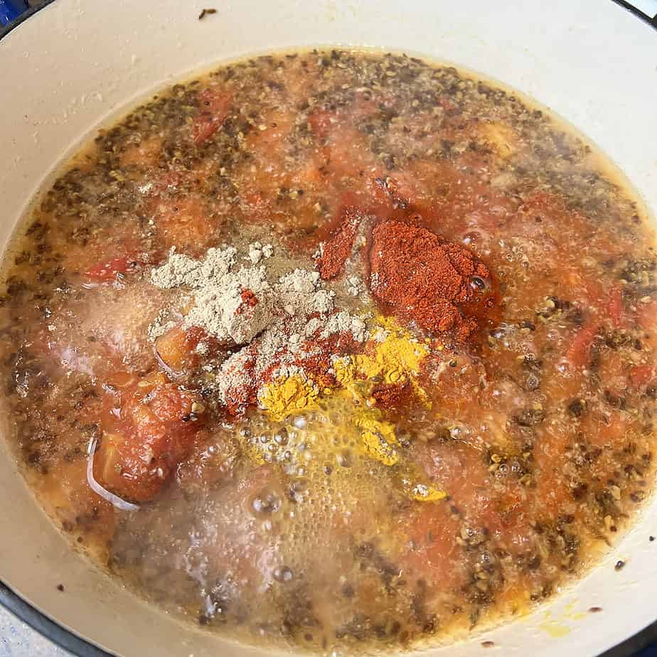 Add Spices To The Tomatoes