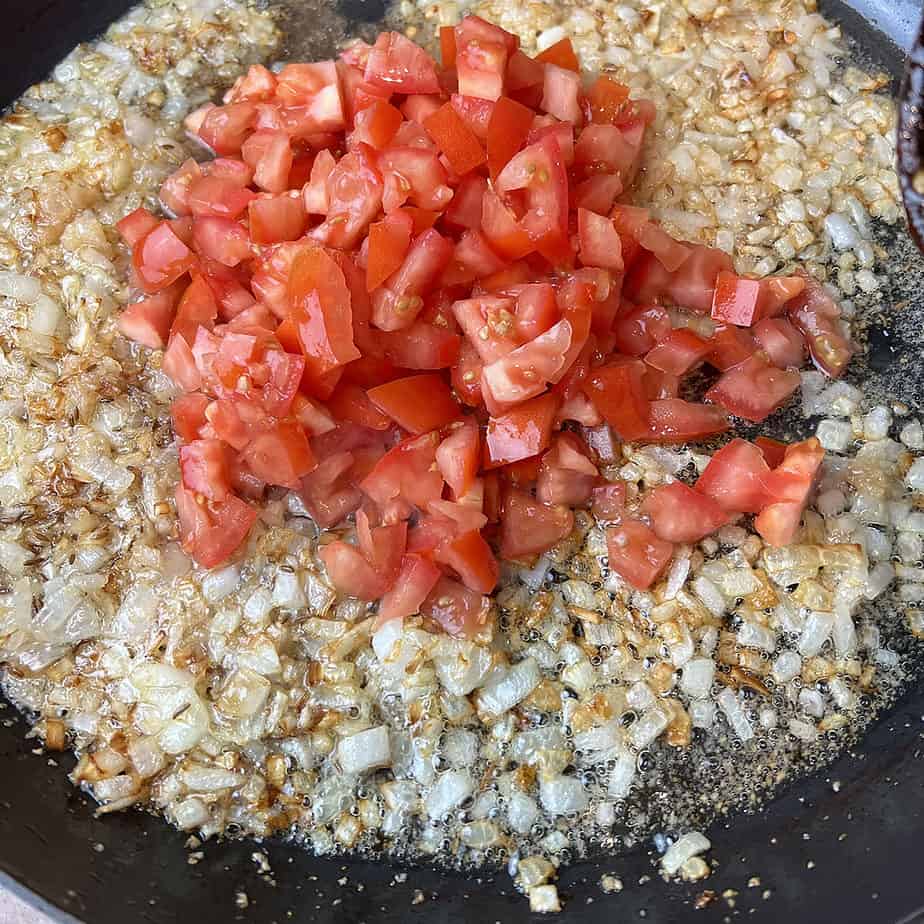 add in the tomatoes