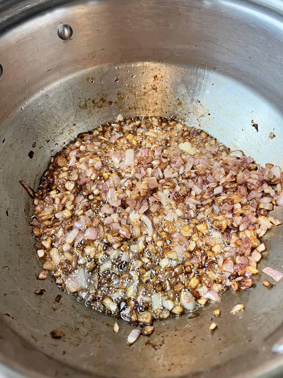 brown the onions and add the garlic