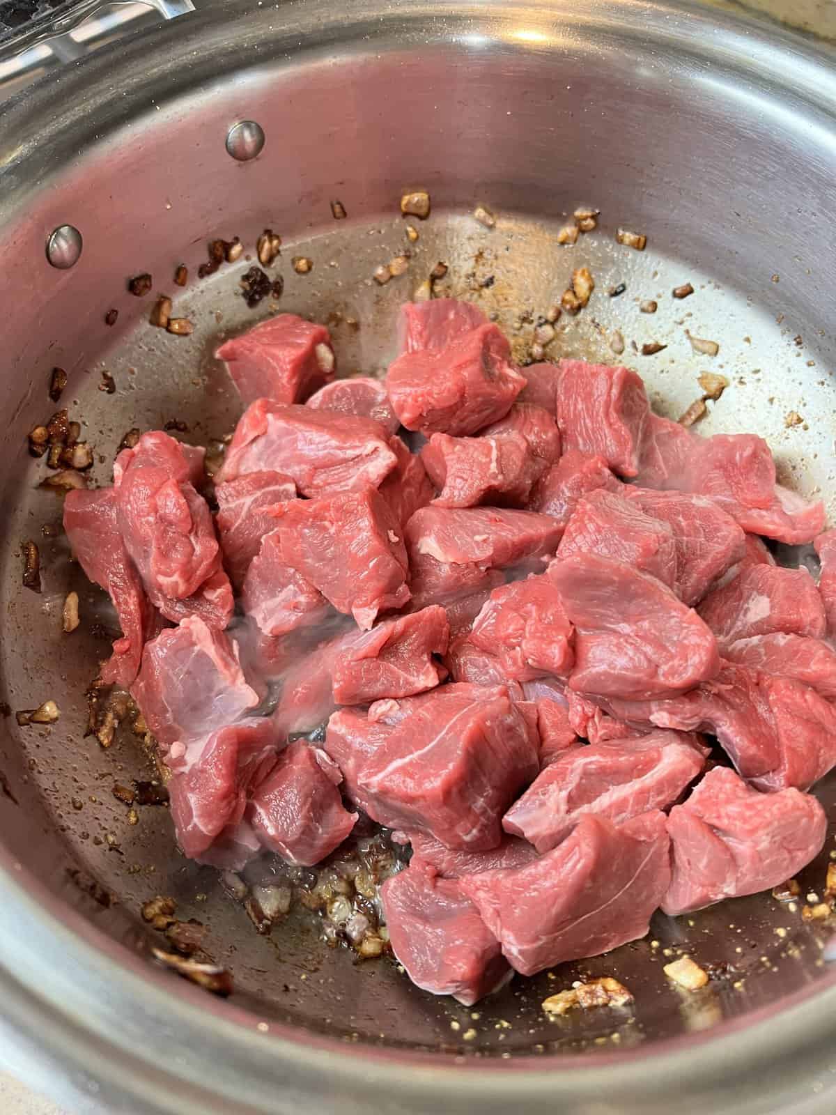 saute the meat for the karahi gosht
