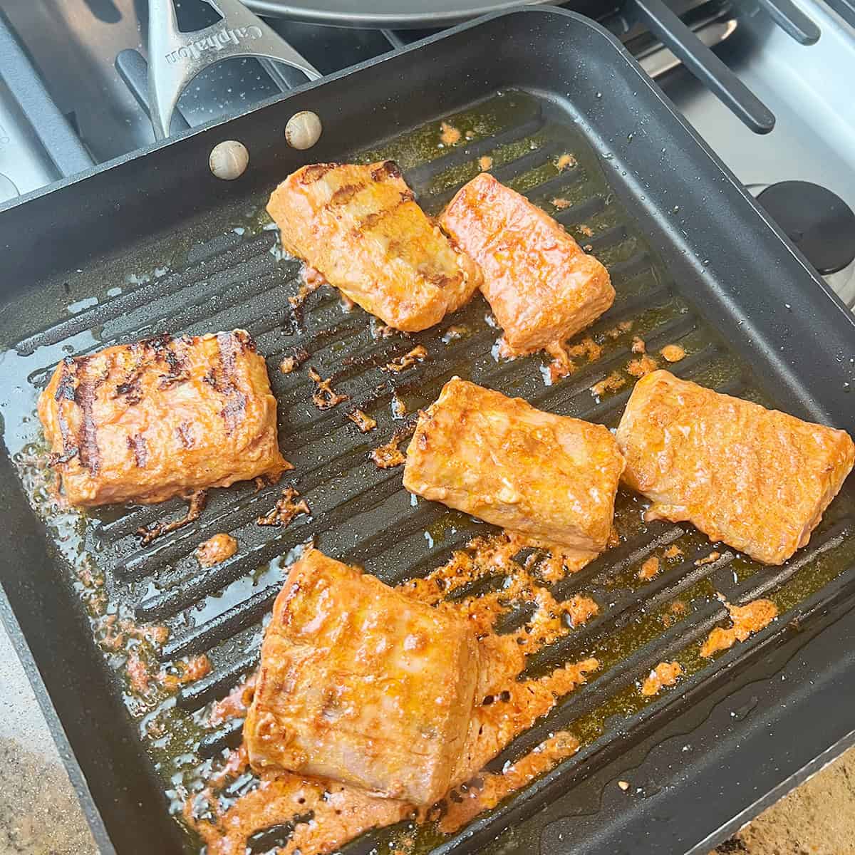 tandoori fish in a grill pan.