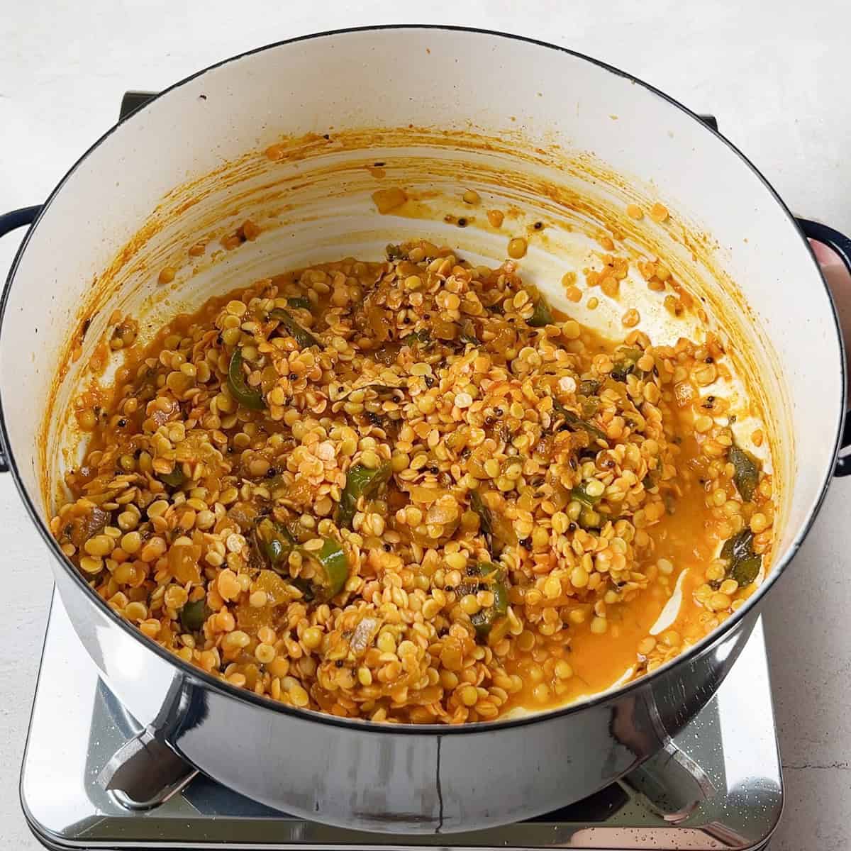 A mixed dal curry being prepared.