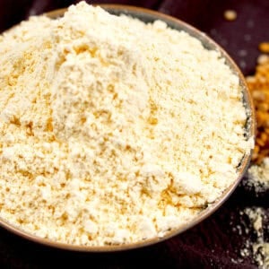 A south Asian chickpea flour, known as gram flour is in a bowl ready for use.