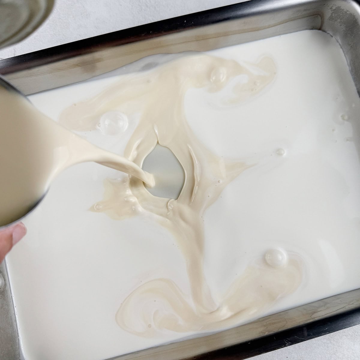 A Pakistani ice cream mixture being prepared.