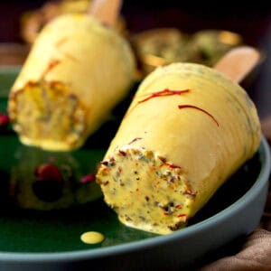 Homemade kulfi with saffron and pistachios.